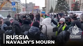 Dozens arrested as Russians mourn Navalnys death despite antidissident laws [upl. by Adolphe]