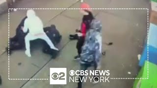 Men caught on video beating NYPD officers in Times Square [upl. by Lexi]