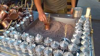 The real Turkish coffee cooked in the hot sand [upl. by Nomzaj]