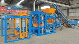 Production of concrete blocks by QT420 automatic concrete brick making machine production line [upl. by Benilda]