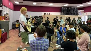 WATCH Ed Sheeran surprises Florida high school students with free guitars tickets [upl. by Ylremik]