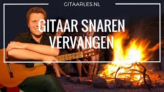 Snaren vervangen van een gitaar [upl. by Hirschfeld]