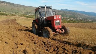 Tractor romanesc 4x4 Turbo Ploughing up hill [upl. by Dalt]