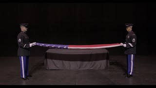 How to fold a US flag for military funeral ceremony  West Point Band [upl. by Desireah]