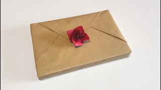 How to wrap a book with kraft paper Gift wrapping [upl. by Alicsirp]