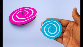 How to make cardboard spinning top  Cardboard spinner  paper toys [upl. by Nnylak902]