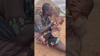 How Ethiopian mom wash a baby in tribe thepaktrekker [upl. by Arinaid]