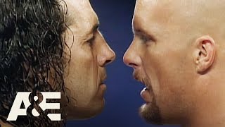 Stone Colds EPIC Rivalry With Bret quotHitmanquot Hart  WWEs Most Wanted Treasures  AampE [upl. by Elok507]