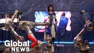 Humanoids COVIDtesting bots on display at Chinas robot expo [upl. by Yekcim]