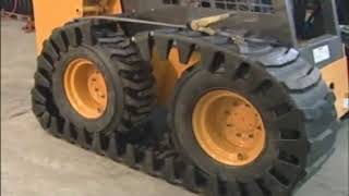 Quick Attach Solideal Skid Steer Over the Tire Track Install [upl. by Nylatsirk295]