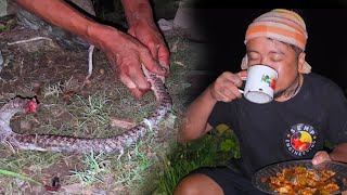 Eating snake and drinking rice beer [upl. by Ardnuahsal]