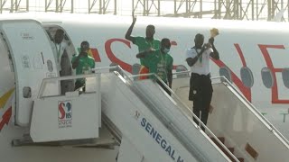 FootballAFCON Senegalese team receives heros welcome from president  AFP [upl. by Haraz]