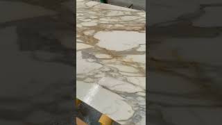 Calacatta Oro Marble Slab [upl. by Olnay647]