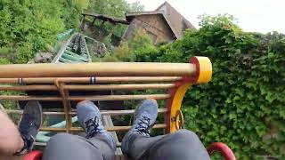 Gsengte Sau bobsled coaster at Tripsdrill in Germany Intertwined with building and logflume POV [upl. by Razatlab349]