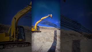 Komatsu PC100 move the reinforcing steel shortsvideo [upl. by Yonatan]