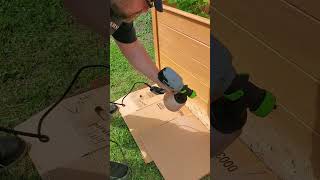 Applying cedar stain to the raised garden beds [upl. by Coleman]