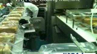 HOBA  Bread Slicer HSA2 Bagger HBR baghand robot Closing conveyor with clipband HTA15 [upl. by Aramenta]