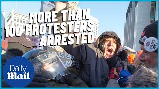 Freedom Convoy Police arrest over 70 protestors in Ottawa at truckers protest [upl. by Stelle]