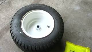 Riding mower front wheels flopping around Craftsman lawn tractor front wheel bearing replacement [upl. by Kenay264]