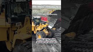 Caterpillars 992G Wheel Loaders Loading Coal On The Trucks [upl. by Hcirdla]