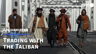 Uzbek traders learn to do business with the Taliban  AFP [upl. by Bathsheeb]