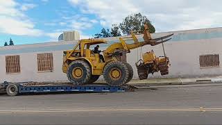 LOADING AN INTERNATIONAL DOZER WITH A CAT 966 [upl. by Tenahs]