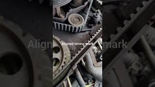 2000 mazda B2500 changing timing belt made easy part5 aligning markings [upl. by Ardnuasac873]