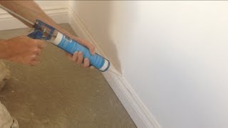 How to caulk fill Skirting boards gun fill [upl. by Lunna]