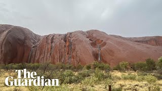 Uluru waterfalls come to life after heavy rainfall in central Australia [upl. by Adila919]