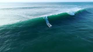 Awake Ravik S electric jet surfboard riding giant waves in Nazaré [upl. by Novihc745]