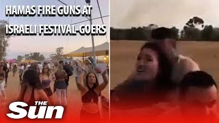 Israel Music Festival Hamas fire guns into crowd and kidnaps Israeli festivalgoers [upl. by Ailuj]