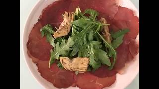 Simple bresaola antipasto  with rocket artichokes and Parmesan [upl. by Camile]