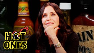 Courteney Cox Becomes Friends With Spicy Wings  Hot Ones [upl. by Enelrats]