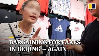 Bargaining for fakes on Beijings Silk Street – again [upl. by Rednasyl]