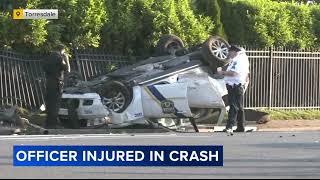 Philadelphia police officer injured after rollover crash in Torresdale [upl. by Pennebaker888]