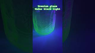 Uranium glass glowing under a black light [upl. by Otes]