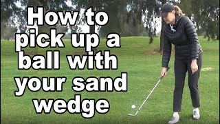 Impress your friends How to pick up the ball with your sandwedge [upl. by Pugh965]