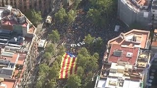 Watch 600000 Catalan independence supporters rally in Barcelona for holiday [upl. by Ainitsirk]