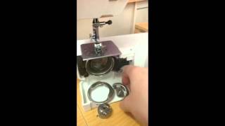 How to pull apart and reassemble the bobbin case area on a front loading sewing machine [upl. by Hanafee618]