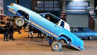 Lowrider Cars Hopping Bouncing amp Cruising in Downtown Los Angeles California Classic Car Show [upl. by Noslrac106]