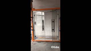 Olide Automatic double swing glass door opener for framless door [upl. by Aniluap]