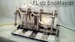 FL02B ENOLMASTER MULTIHEAD VACUUM FILLER  Oil into Plastic Liquid Solutions [upl. by Noiro]