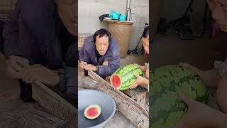 The process of cutting watermelon with steel knife [upl. by Eldrid531]