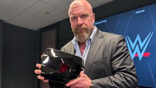 Triple H unboxes YouTube Red Diamond Play Button for 100 million subscribers [upl. by Tikna474]