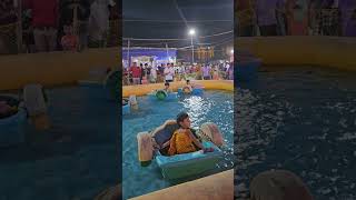 Fun boat rides for children at Durga Puja Mela  Kids Swimming Boat  Kids Boat ⛵ yt shortvideo [upl. by Eatnoid668]