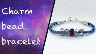 How to make a kumihimo bracelet with charm beads [upl. by Anivahs]