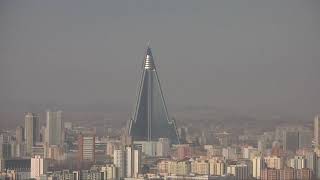 Scenic Views of Pyongyang Ryugyong Hotel Juche Tower amp Yanggakgdo Tourist Hotel archives [upl. by Yenruogis]