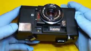 Konica C35 AF Flash 38mm Fixed Lens Camera Sn 869198 [upl. by Enivid]