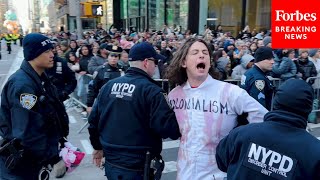 WATCH ProPalestinian Protesters Are Detained After Disrupting Macy’s Thanksgiving Day Parade [upl. by Leuneb]