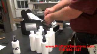 Dispensamatic Bottlematic 10 Round Label Applicator [upl. by Tess]